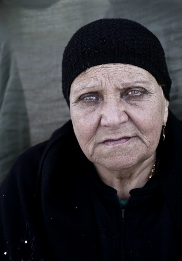 A Christian woman, who fled northern Sinai months ago due to fighting in el-Arish, poses for a photograph as she rests at a youth guest house, in Ismailia, 120 kilometers (75 miles) east of Cairo, Egypt Feb. 26, 2017. (AP Photo/Nariman El-Mofty)