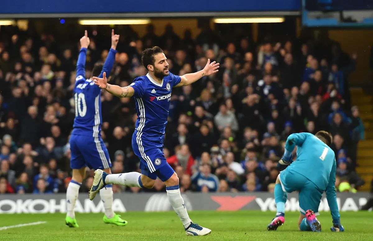 Chelsea's Spanish midfielder Cesc Fabregas (C) celebrates scoring the opening goal during the English Premier League football match between Chelsea and Swansea at Stamford Bridge in London on Feb 25, 2017. (Glyn Kirk/AFP/Getty Images)