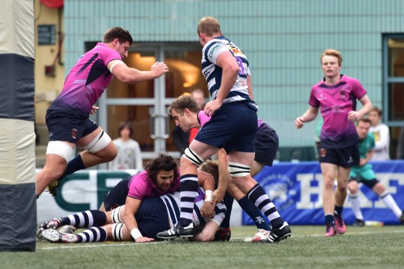 Ben Willis pushes through to score for HKFC in their Grand Championship quarter final match at Sports Road, on Saturday Feb 26, 2017. (Bill Cox/Epoch Times)