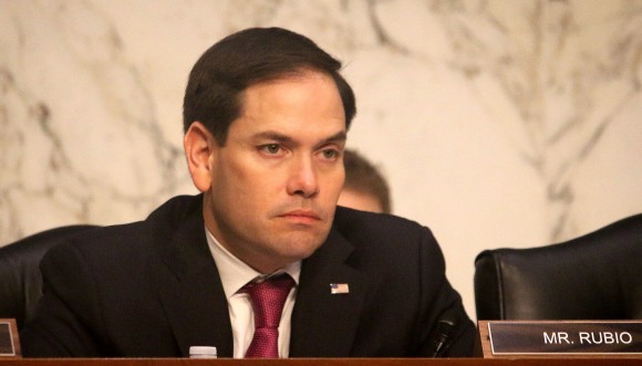 Chairman of the Congressional-Executive Commission on China Marco Rubio listens to testimony at a hearing, titled,