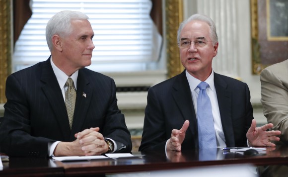 Vice President Mike Pence listens at left as Health and Human Services Secretary Tom Price speaks during a meeting with conservative groups to discuss healthcare, Friday, March 10, 2017, in the Indian Treaty Room of the Eisenhower Executive Office on the White House complex in Washington. (AP Photo/Pablo Martinez Monsivais)
