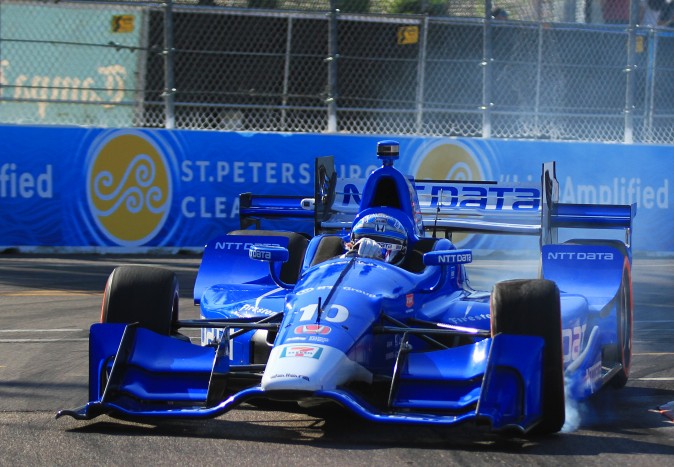 Ganassi driver Tony Kanaan locks up his brakes in his quest to find a little more speed during the Fast Six qualifying session. (Chris Jasurek/Epoch Times)
