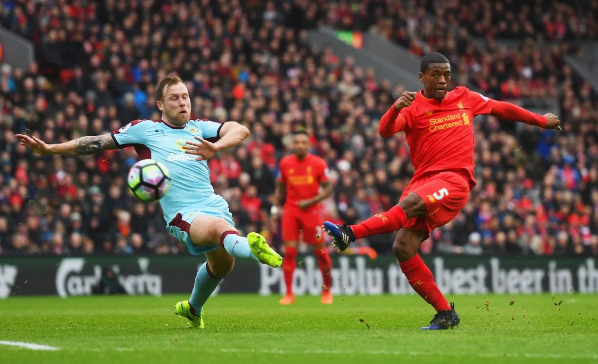 Georginio Wijnaldum of Liverpool shoots past Scott Arfield of Burnley during the English Premier League match between Liverpool and Burnley at Anfield on March 12, 2017. (Michael Regan/Getty Images)