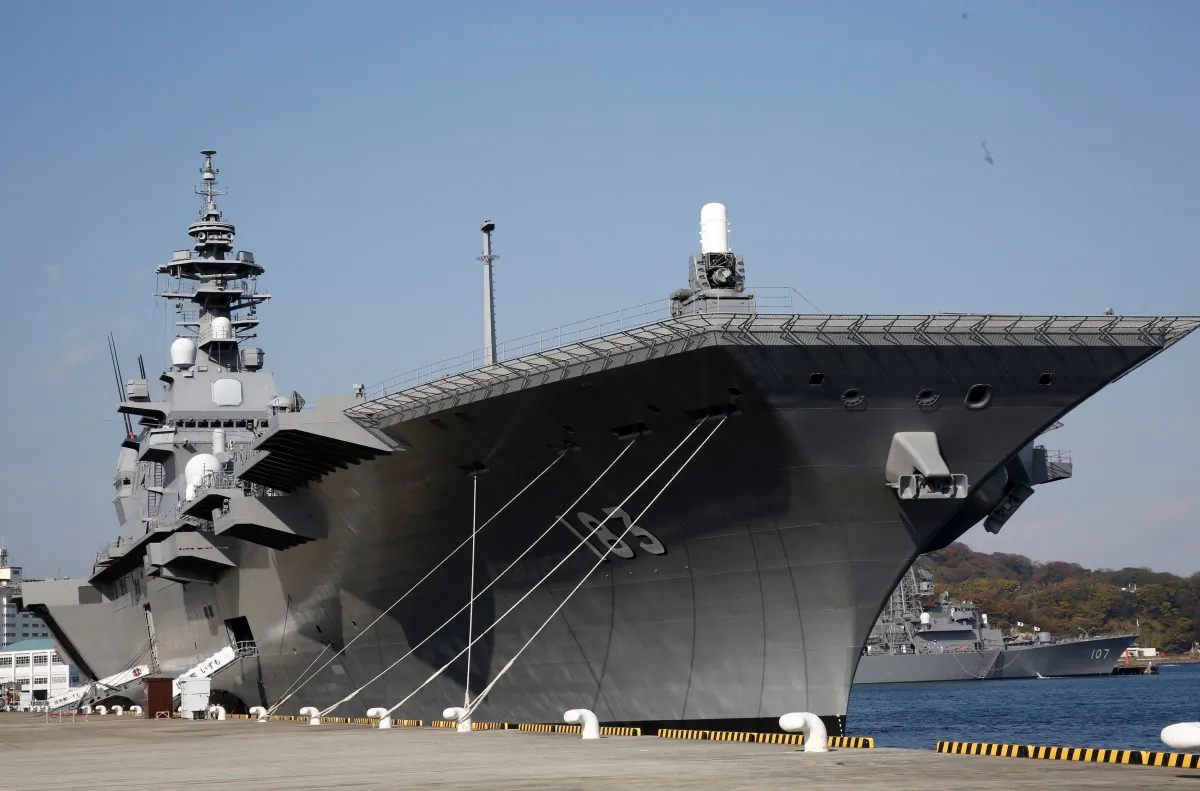 Japan Maritime Self Defense Force's helicopter carrier Izumo is seen at JMSDF Yokosuka base in Yokosuka, south of Tokyo, Japan, on Dec. 6, 2016. (REUTERS/Kim Kyung-Hoon)
