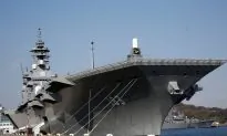 Japan Plans to Send Largest Warship to South China Sea, Sources Say