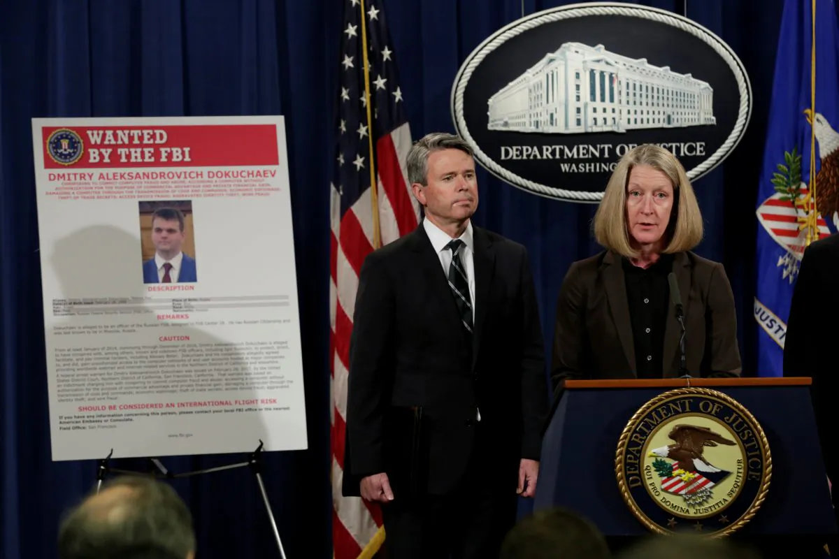 Acting AAG for National Security Mary McCord speaks in front of a poster of a suspected Russian hacker during FBI National Security Division and the U.S. Attorney's Office for the Northern District of California joint news conference at the Justice Department in Washington, on March 15, 2017. (Yuri Gripas/Reuters)