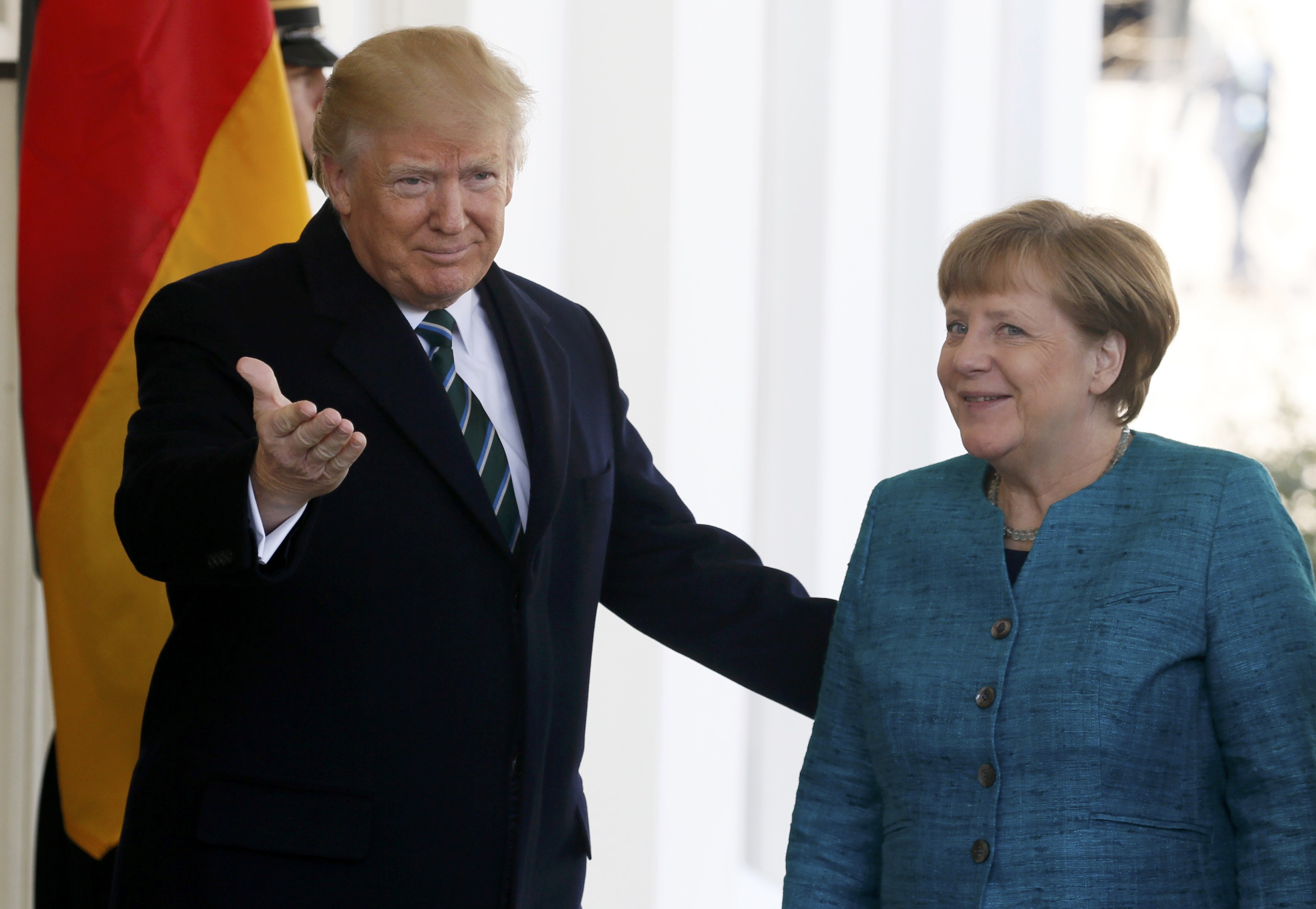 President Trump welcomes German Chancellor Angela Merkel at the White House. (REUTERS/Jim Bourg)