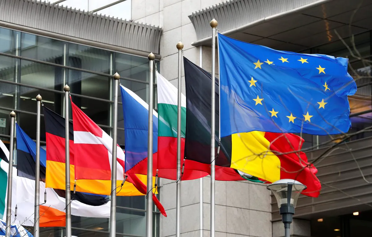 European and national flags fly outside the European Parliament in Brussels, Belgium on March 1, 2017. Although it has added many members since its founding in 1957, the EU has strayed from its original course. (REUTERS/Yves Herman)