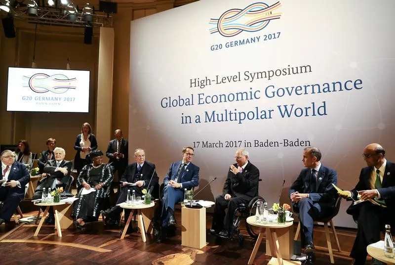 German Bundesbank President Jens Weidmann and German Finance Minister Wolfgang Schaeuble attend a Symposium at the G20 Finance Ministers and Central Bank Governors Meeting in Baden-Baden, Germany, on March 17, 2017. (REUTERS/Kai Pfaffenbach)