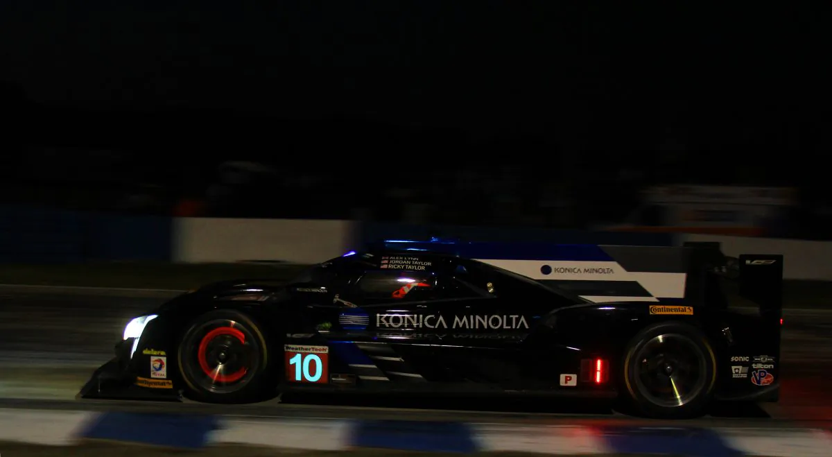 Jordan Taylor in the #10 Konica-Minolta Cadillac leads the IMSA Twelve Hours of Sebring after ten hours. (Chris Jasurek/Epoch Times)