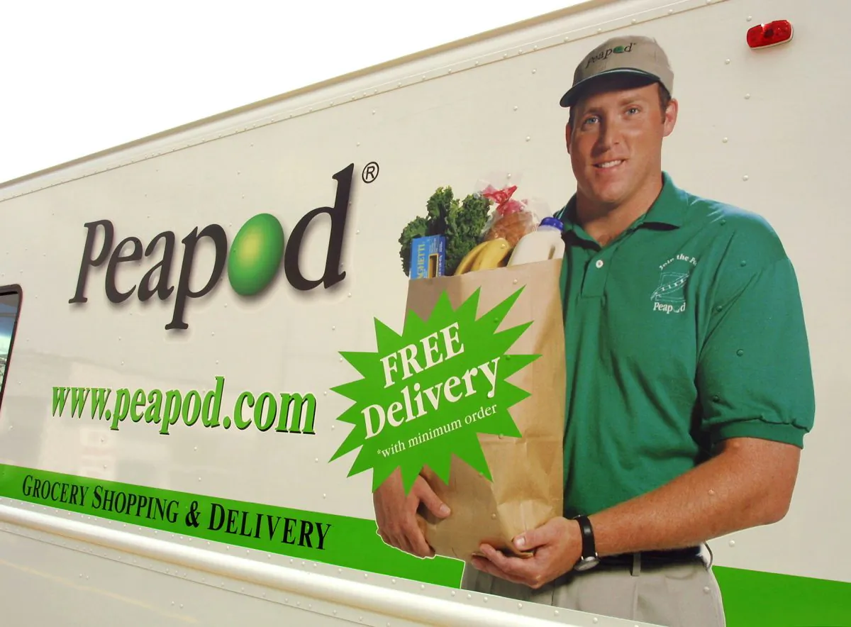 The side of a Peapod grocery delivery truck in Niles, Ill. is seen in a file photo. (Photo by Tim Boyle/Getty Images)