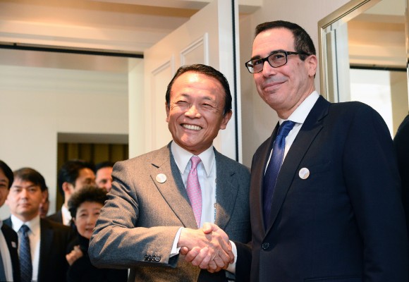US Secretary of the Treasury Steven Mnuchin (R) shakes hands with Japanase Finance Minister Taro Aso prior bilateral talks during the G20 Finance Ministers and Central Bank Governors Meeting in Baden-Baden, southern Germany, on March 17, 2017. Finance ministers from the world's top nations gather in Germany on March 17, as fears grow of a looming trade war over US President Donald Trump's America First policy. (THOMAS KIENZLE/AFP/Getty Images)