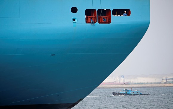 A crew member looks out from the world's largest container ship, the MV Maersk Mc-Kinney Moller as it berths during its maiden port of call at a PSA International port terminal in Singapore, Sept. 27, 2013. (REUTERS/Edgar Su/File Photo)