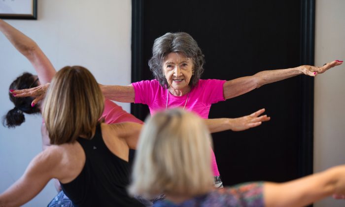 Yoga master Tao Porchon-Lynch  instructs a yoga class in Hartsdale, N.Y., on Jan. 16, 2017. The 98-year-old Porchon-Lynch has been recognized by Guinness World Records as the world's oldest yoga instructor. (DON EMMERT/AFP/Getty Images)