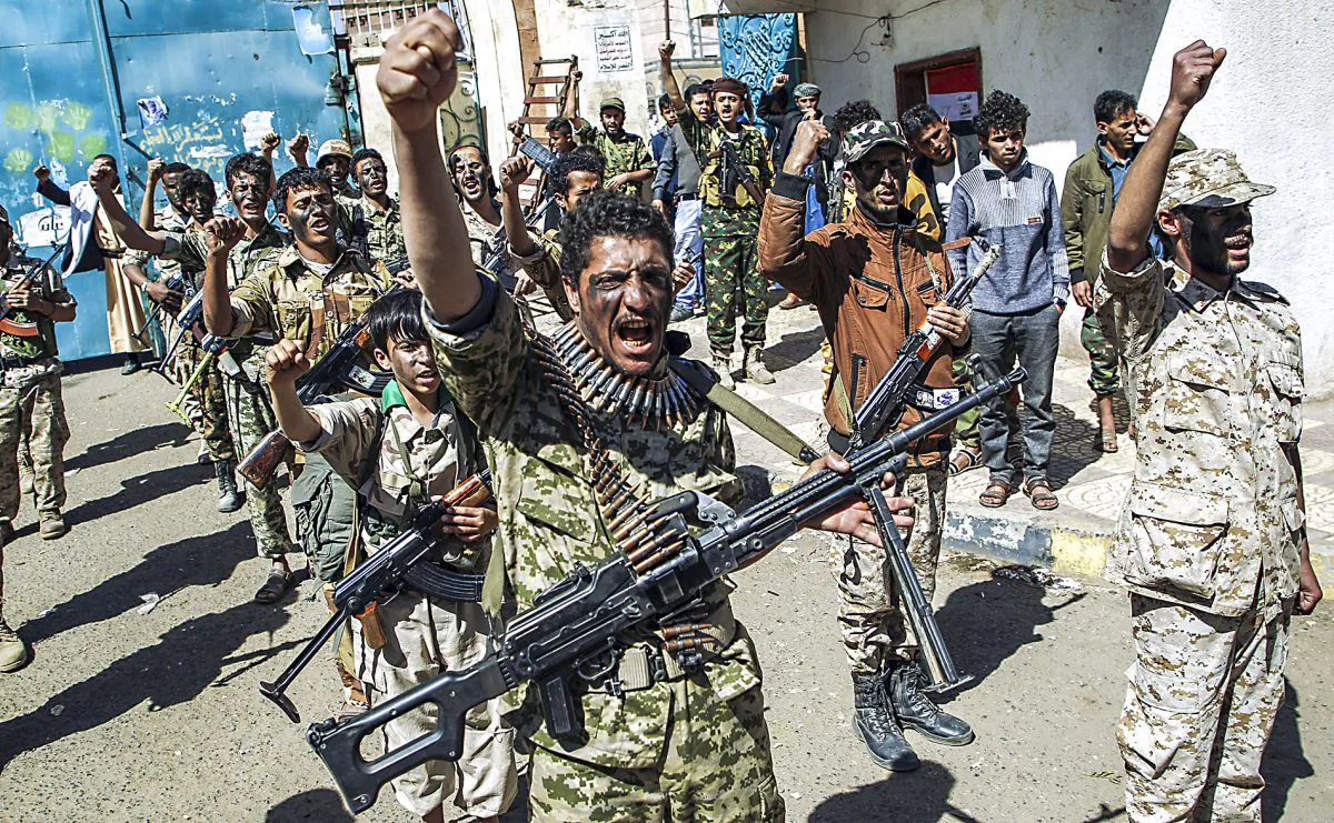 Newly recruited Houthi fighters chant slogans in the capital Sanaa on Feb. 2 to mobilize more fighters to fight pro-government forces in several Yemeni cities. (MOHAMMED HUWAIS/AFP/Getty Images)