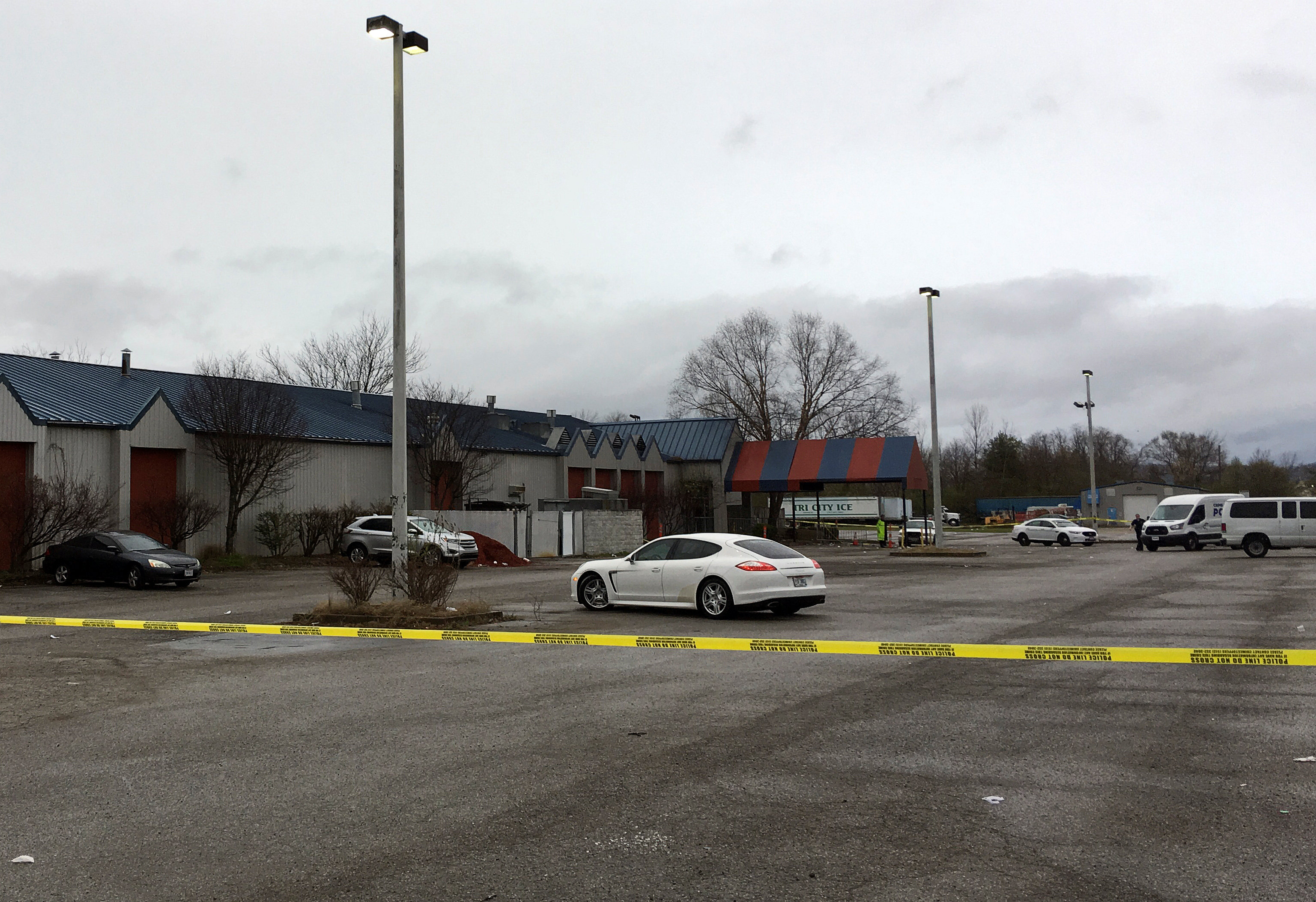 Police tape blocks access to the crime scene after a mass shooting at the Cameo Nightlife club in Cincinnati, Ohio, on March 26, 2017. REUTERS/Caleb Hughes