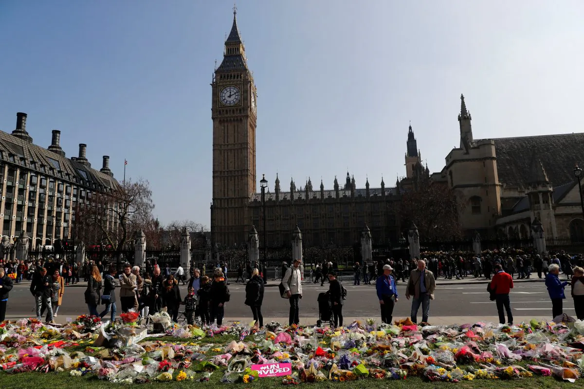 Floral tributes lie in Parliament Square following the attack in Westminster, central London on March 27, 2017. (REUTERS/Stefan Wermuth)
