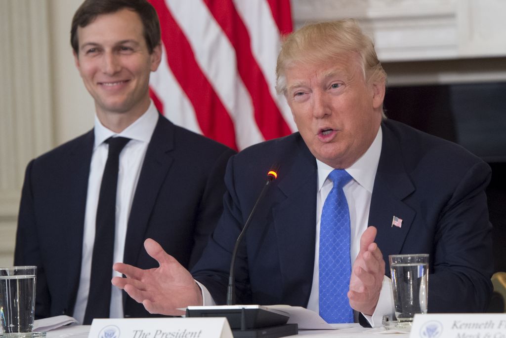 President Donald Trump alongside White House Senior Advisor Jared Kushner (L), during a meeting with manufacturing CEOs in the State Dining Room at the White House in Washington on Feb. 23, 2017. (SAUL LOEB/AFP/Getty Images)