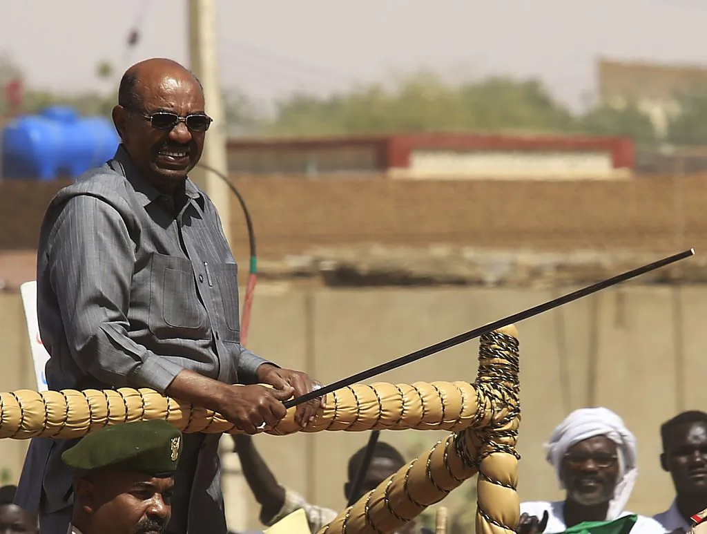 Sudan's President Omar al-Bashir during a campaign rally for the upcoming presidential elections in El-Fasher, in North Darfur, on April 8, 2015. (ASHRAF SHAZLY/AFP/Getty Images)