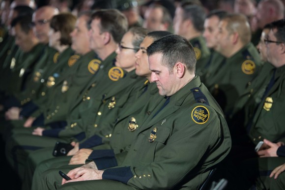 Members of the US Border patrol wait for President Donald Trump to speak to staff of the Department of Homeland Security in Washington on Jan. 25, 2017. (NICHOLAS KAMM/AFP/Getty Images)