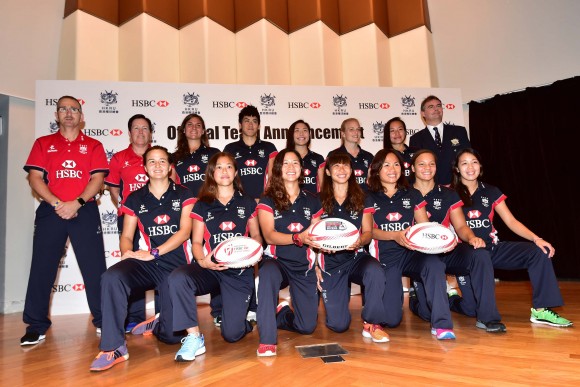 Hong Kong Women's squad together with (L) Paul John, Men's coach; Women's Head coach and on far right Robbie McRobbie Deputy CEO of the HKRU: Team Back Row (L-R): Amelie Seure, Aggie Poon Pak-yan, Sham Wai-sum, Adrienne Garvey, Christy Ka-chi, Robbie McRobbie Deputy CEO of the HKRU. Front Row : Colleen Tjosvold, Yuen Lok-yee, Candy Cheng Tsz-ting, Chong Ka-yan, Nam Ka-man, Natasha Olson-Thorne, Ivy Kwong Sau-yan. (Bill Cox/Epoch Times)
