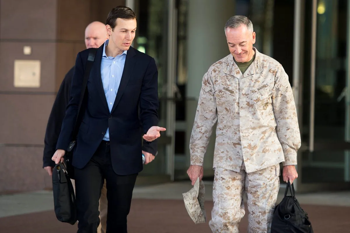 U.S. President Donald Trump's son-in-law and senior advisor Jared Kushner (L) speaks with Marine Corps Gen. Joseph F. Dunford Jr., chairman of the Joint Chiefs of Staff, before departing for Iraq from Ramstein Air Base, Germany on April 3, 2017. (DoD/Navy Petty Officer 2nd Class Dominique A. Pineiro/Handout via REUTERS)