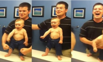 Adorable Toddler Imitates Father Flexing His Muscles