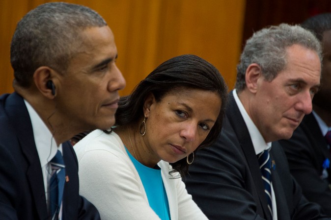 Susan Rice (C) looks on as Former President Barack Obama (L) and US Trade Representative Michael Froman (R) meet with Vietnam's Prime Minister Nguyen Xuan Phuc in Hanoi on May 23, 2016. (JIM WATSON/AFP/Getty Images)