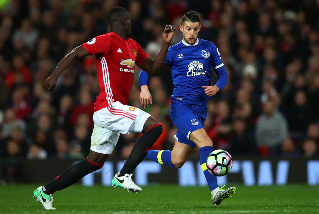 Kevin Mirallas of Everton (R) attempts to take the ball past Eric Bailly of Manchester United (L) during the Premier League match between Manchester United and Everton at Old Trafford on April 4, 2017 in Manchester, England. (Clive Brunskill/Getty Images)