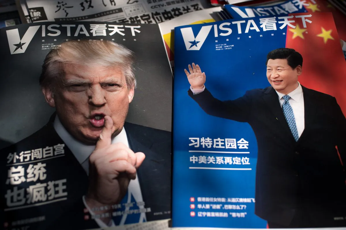 Magazines featuring front pages of US President Donald Trump (L) and China's President Xi Jinping (R) are displayed at a news stand in Beijing on April 6, 2017.
The first summit between US President Donald Trump and his Chinese counterpart Xi Jinping will be of "great significance" for global peace, the two countries' top diplomats agreed ahead of the meeting. The two meet at Trump's Mar-a-Largo resort in Florida on April 6 and 7. (NICOLAS ASFOURI/AFP/Getty Images)