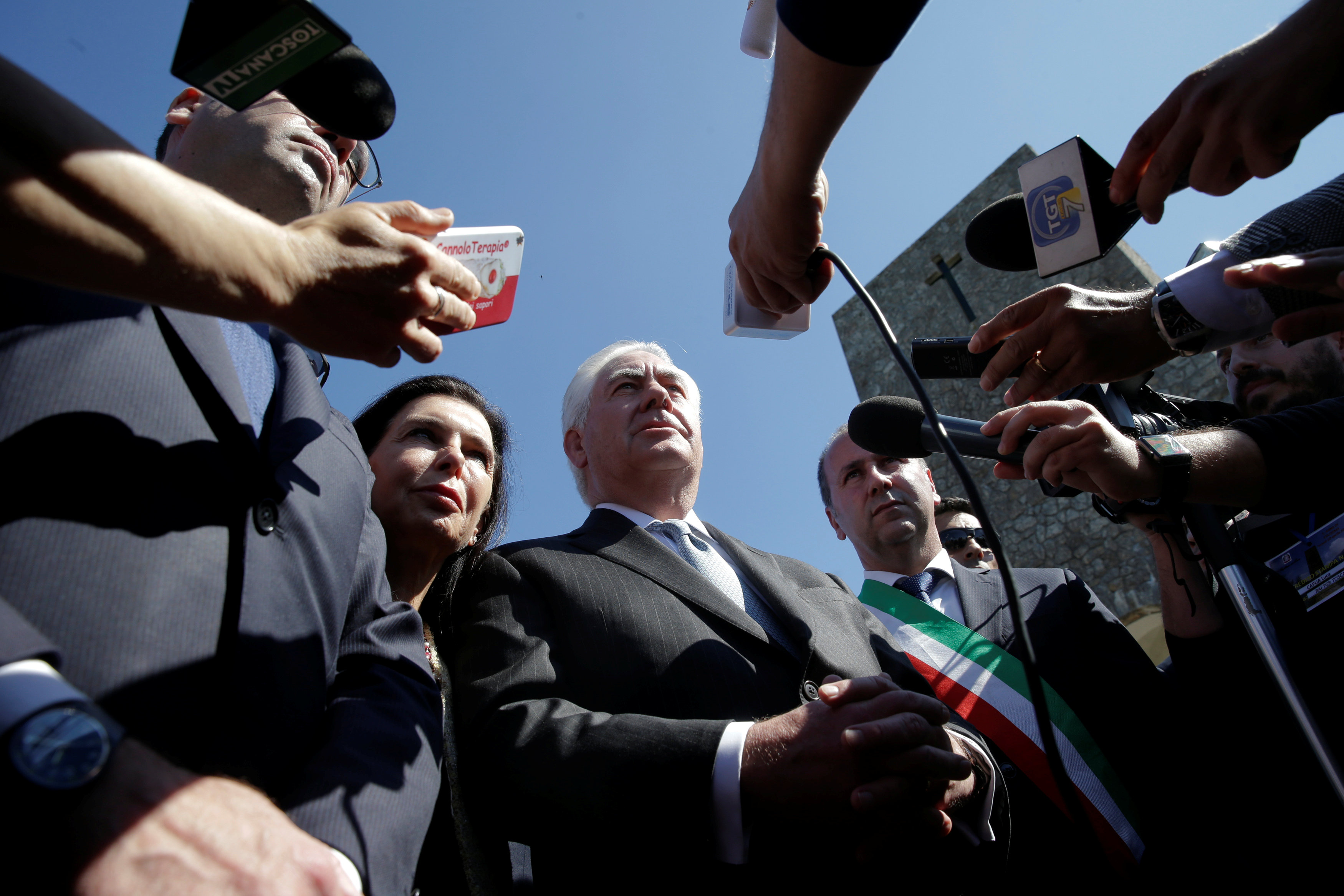 U.S. Secretary of State Rex Tillerson, (C) during a ceremony at the Sant'Anna di Stazzema memorial, dedicated to the victims of the massacre committed in the village of Sant'Anna di Stazzema by the Nazis in 1944 during World War II, Italy pm April 10, 2017. REUTERS/Max Rossi
