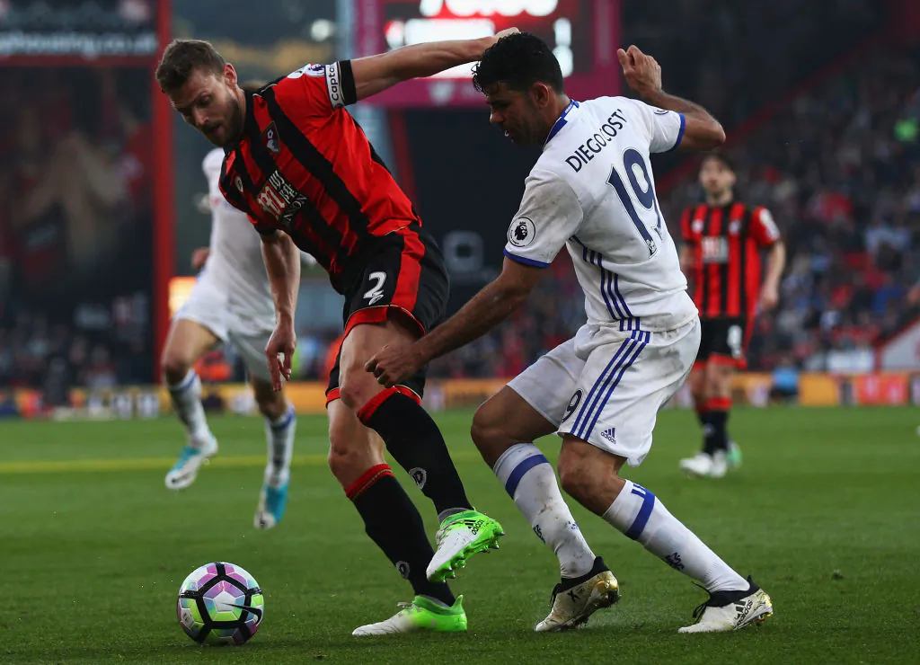 Simon Francis of AFC Bournemouth and Diego Costa of Chelsea battle for possession during the Premier League match between AFC Bournemouth and Chelsea at Vitality Stadium on April 8, 2017 in Bournemouth, England. (Ian Walton/Getty Images)