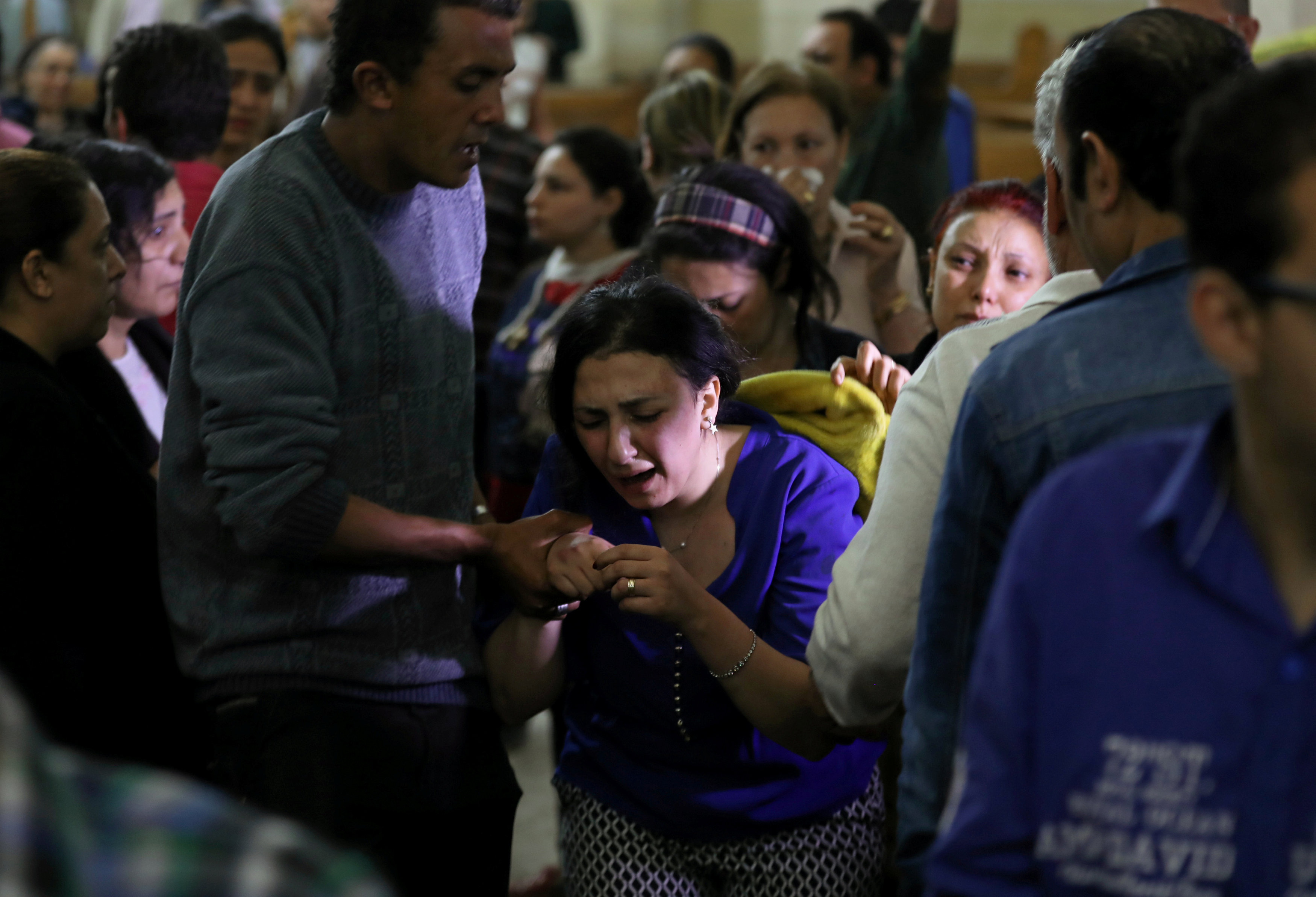 A relative of a victim reacts inside the Coptic church that was bombed on Sunday in Tanta, Egypt on April 9, 2017. (REUTERS/Mohamed Abd El Ghany)