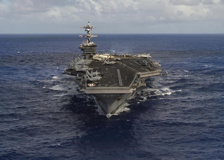 The aircraft carrier USS Carl Vinson (CVN 70) transits the Pacific Ocean on Jan. 30, 2017. (U.S. Navy Photo by Mass Communication Specialist 3rd Class Tom Tonthat/Handout via Reuters)
