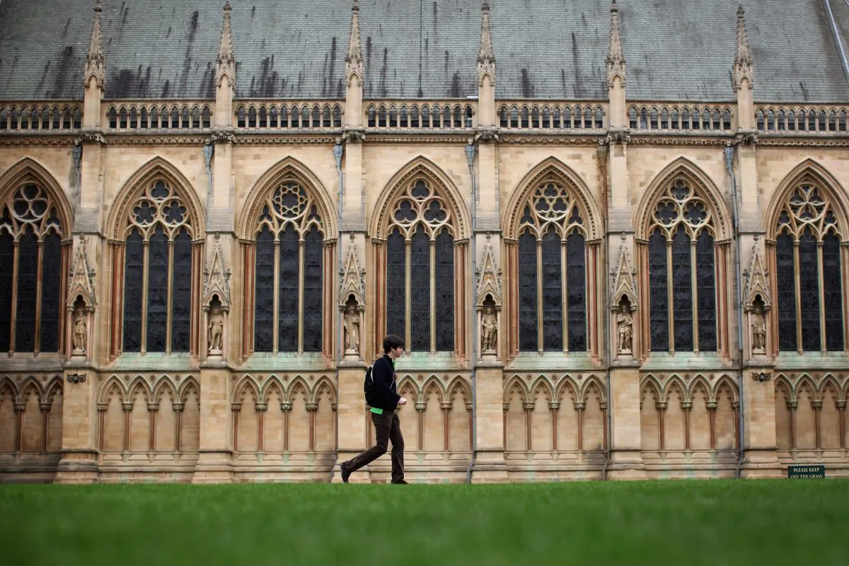A student walks through St John's College in Cambridge, England, on March 13, 2012. (Dan Kitwood/Getty Images)