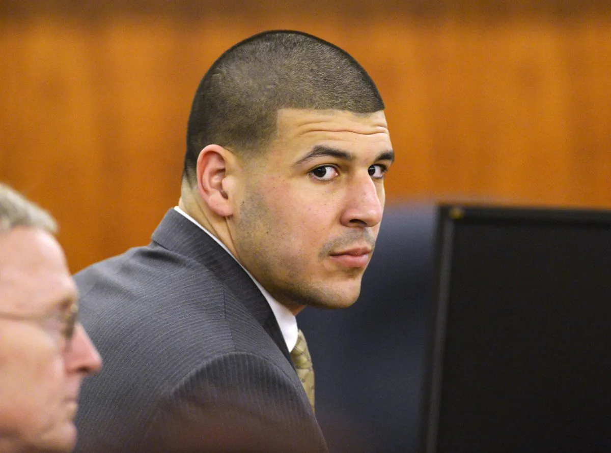 Former NFL player Aaron Hernandez and defense attorney Charles Rankin wait in the courtroom during the jury deliberation in his murder trial at the Bristol County Superior Court in Fall River, Massachusetts on April 10, 2015. (REUTERS/CJ Gunther/Pool)