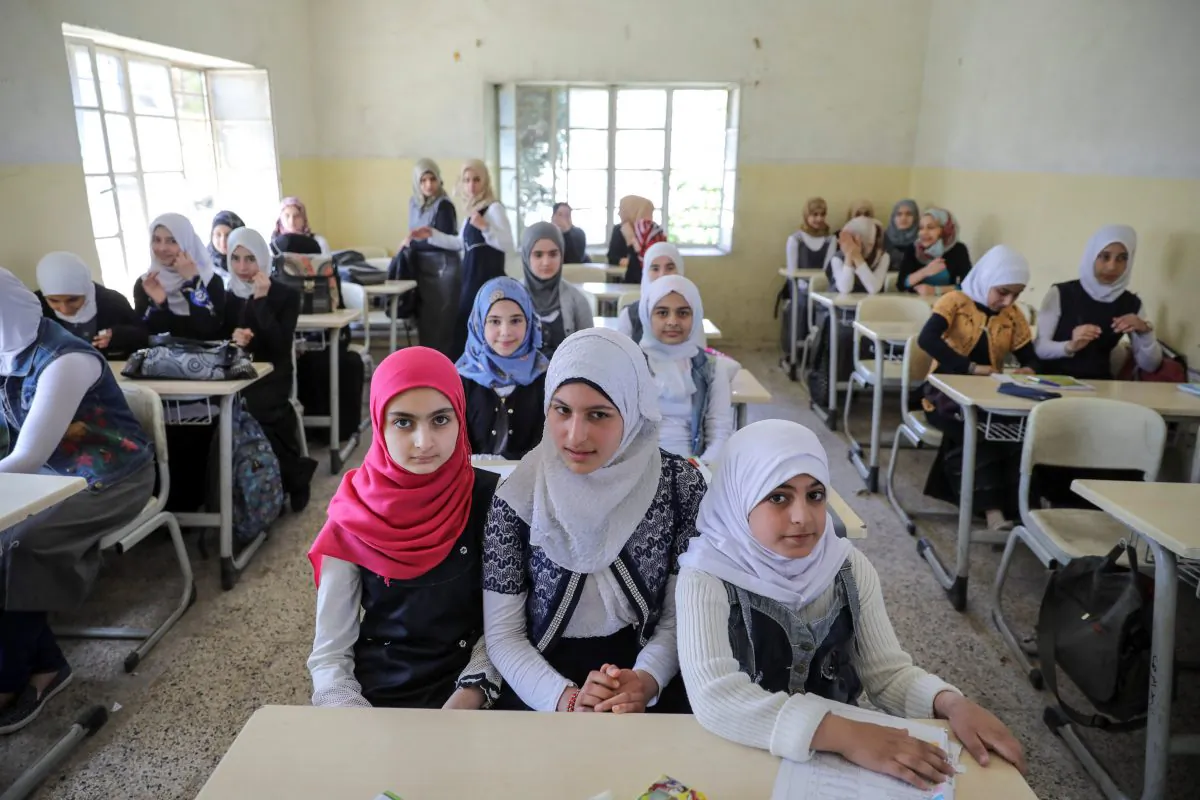 Pupils attend a class at an elementary school in eastern Mosul, Iraq on April 17, 2017. (REUTERS/Marko Djurica)