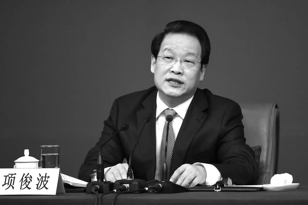 Xiang Junbo, chairman of China Insurance Regulatory Commission (CIRC) at the National People's Congress in Beijing on March 12, 2016. (WANG ZHAO/AFP/Getty Images)