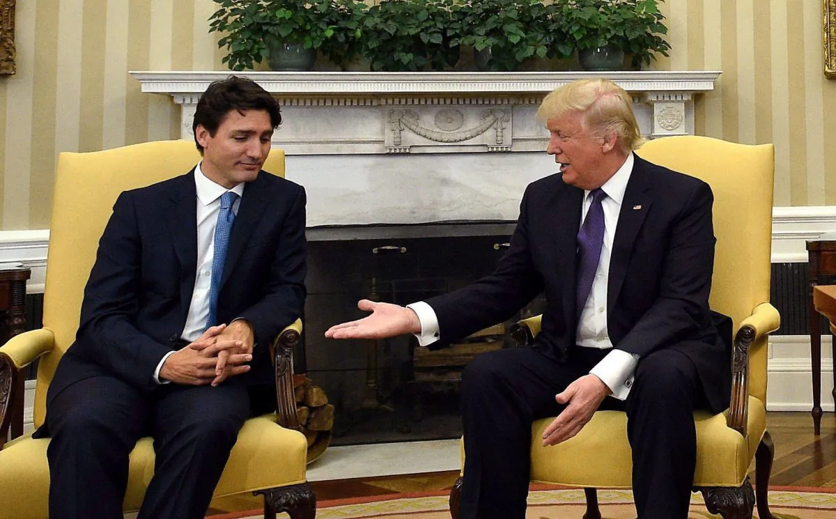 Prime Minister Justin Trudeau meets with US President Donald Trump in the Oval Office of the White House on Feb. 13, 2017. A NAFTA review panel has unanimously ordered the U.S. Department of Commerce to reconsider its costly duties against Canadian mills that produce glossy paper.  (The Canadian Press/Sean Kilpatrick)