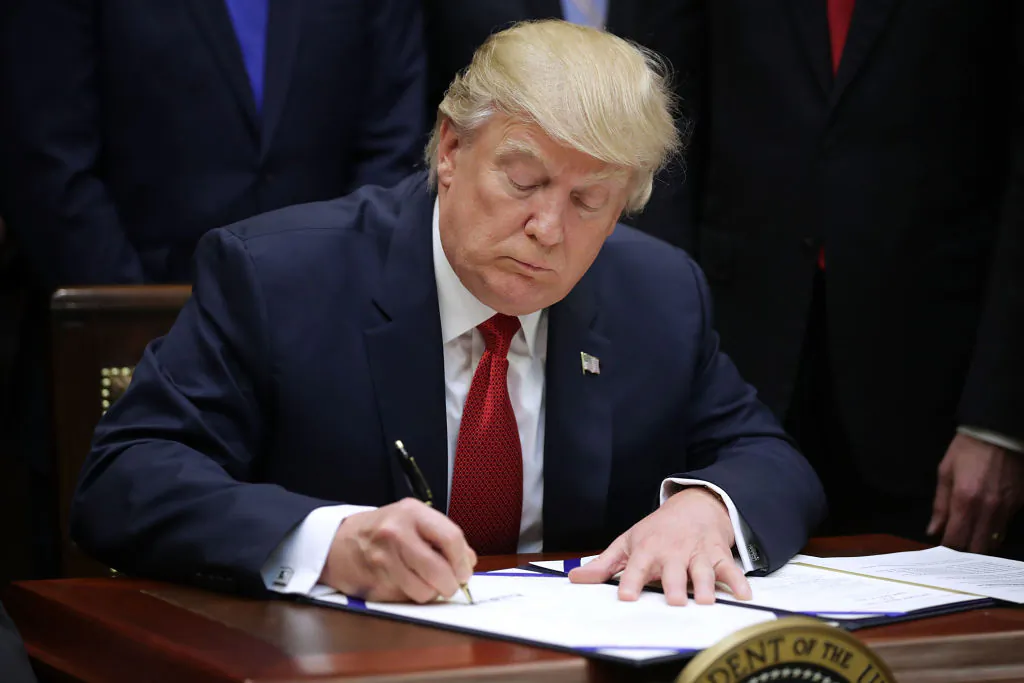 President Donald Trump signs the Veterans Choice Program And Improvement Act in the Roosevelt Room at the White House in Washington on April 19, 2017. (Chip Somodevilla/Getty Images)