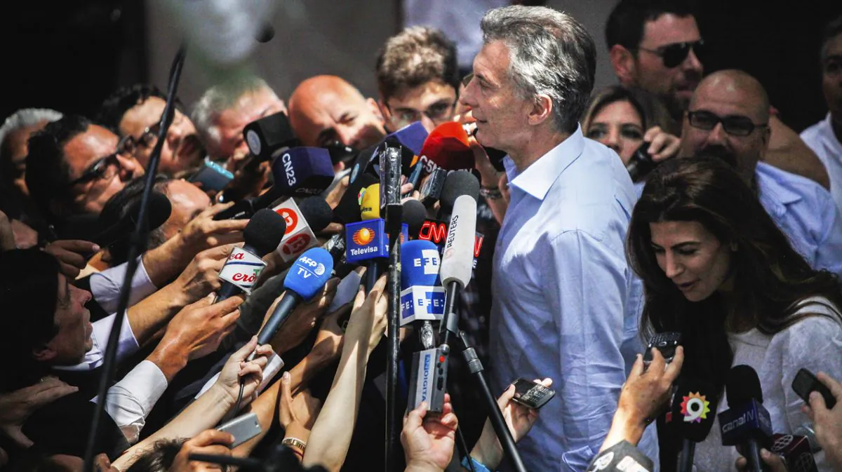 Mauricio Macri speaks to the press after voting in Buenos Aires, Argentina, on Nov. 22, 2015. In his first 16 months in office, Macri has pushed through many tough reforms. (EITAN ABRAMOVICH/AFP/GETTY IMAGES)