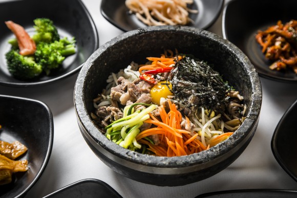 Bibimbap, a popular rice dish with vegetables, is served in a stone pot.(Samira Bouaou/The Epoch Times)
