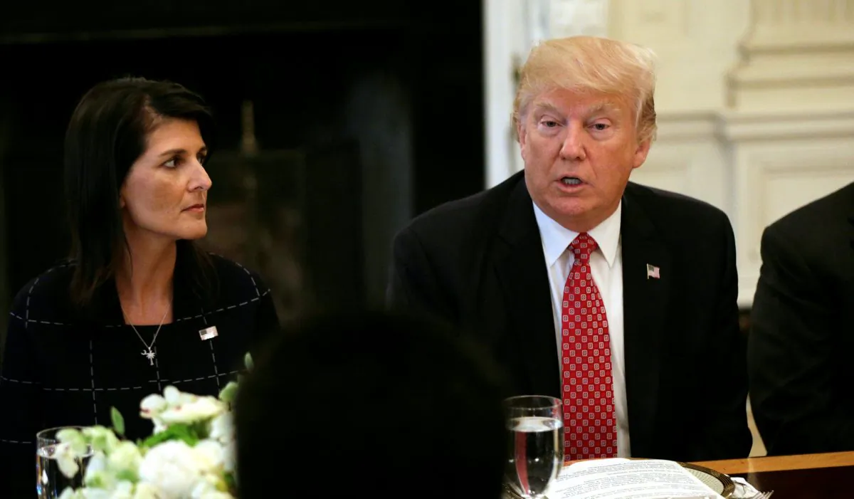 With U.S. Ambassador to the United Nations Nikki Haley at his side (L), President Donald Trump speaks during a working lunch with ambassadors of countries on the UN Security Council at the White House in Washington on April 24, 2017. (Kevin Lamarque/Reuters)