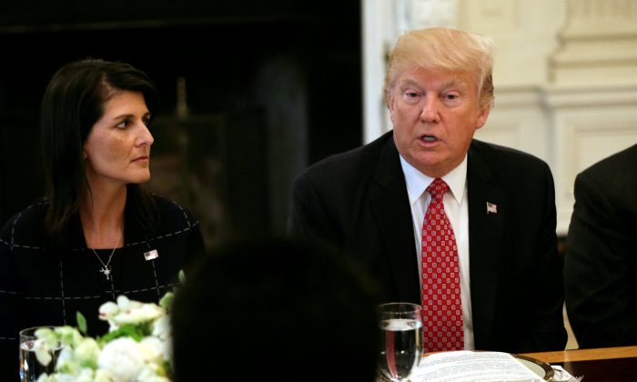 With U.S. Ambassador to the United Nations Nikki Haley at his side (L), President Donald Trump speaks during a working lunch with ambassadors of countries on the UN Security Council at the White House in Washington on April 24, 2017. (Kevin Lamarque/Reuters)