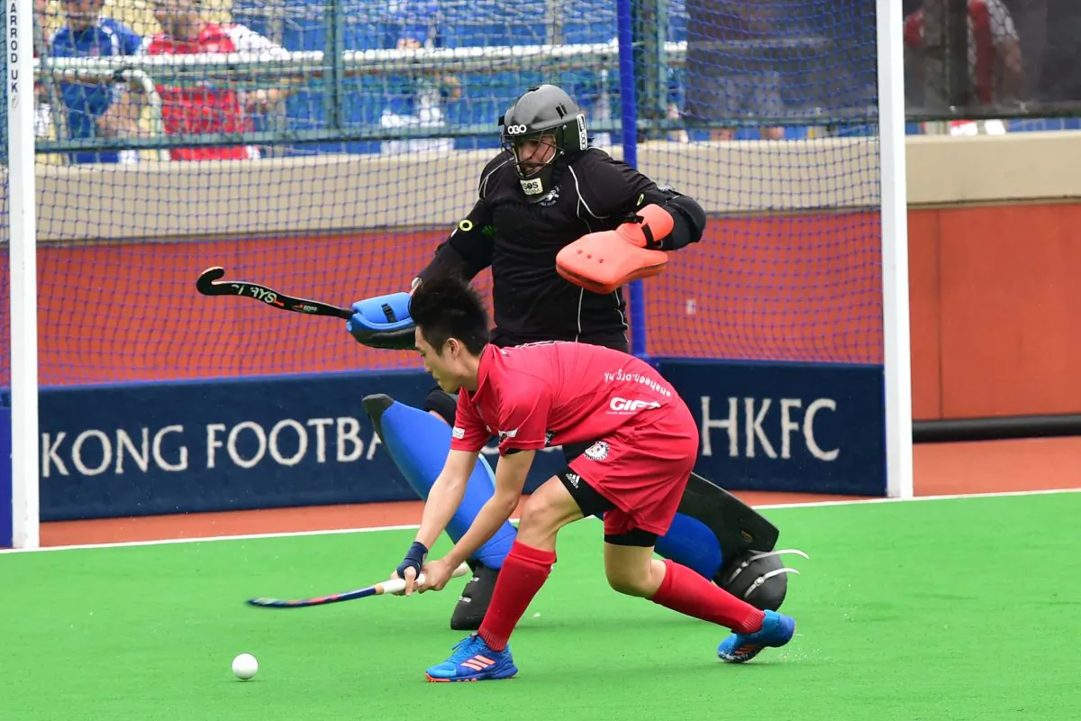 YU Chi Wai scores Shaheen-A’s 2nd goal during their 4-3 win in the Holland Cup quarter final against HKFC-B at HKFC on Sunday April 23, 2017. (Bill Cox/Epoch Times)