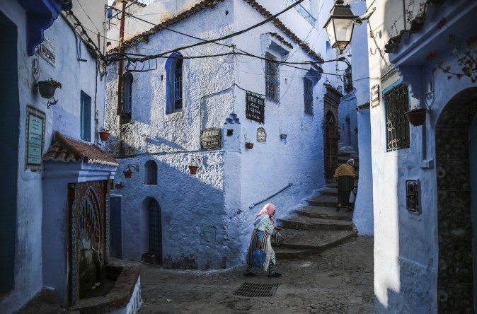 Women walk in an alleyway in the Medina of Chefchaouen, a picturesque town well-known for its blue painted houses and alleyways in northern Morocco on April 27, 2017. (AP Photo/Mosa'ab Elshamy) 