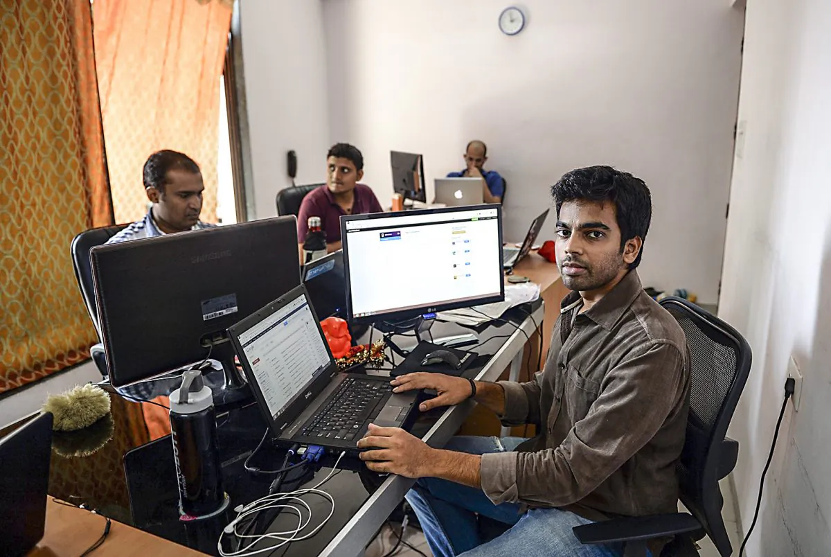 Indian software developer and entrepreneur Nischal Shetty at his office in Mumbai, India, in this file photo. India’s massive technology outsourcing industry employs millions of people. (PUNIT PARANJPE/AFP/Getty Images)