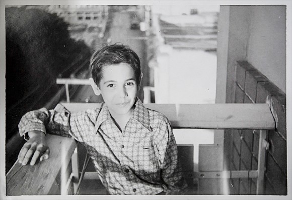 Jesús de León as a young boy on his aunt's balcony in Havana in the early 1970s. (Courtesy of Jesús de León)