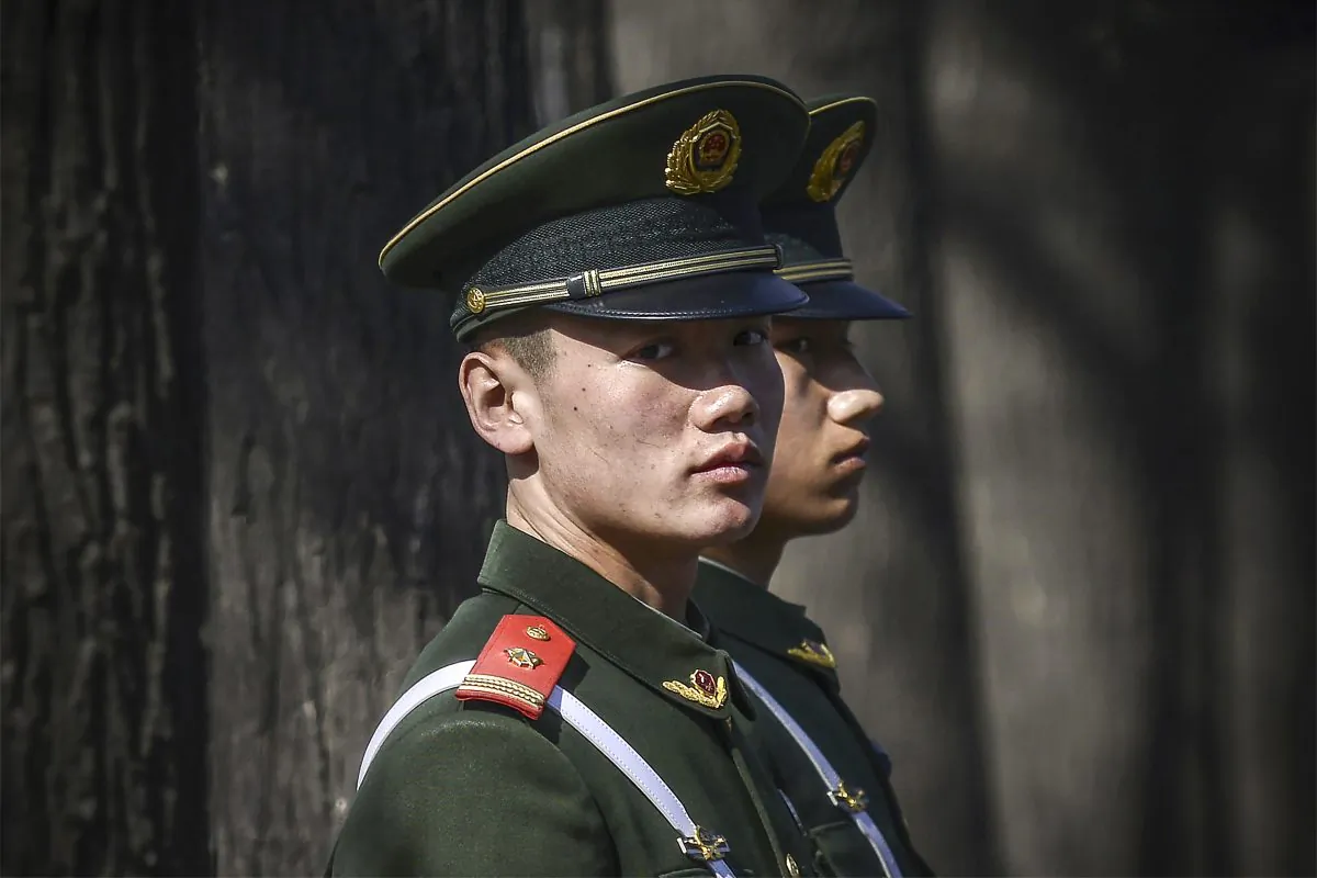 Paramilitary police officers stand guard outside the Great Hall of the People in Beijing on March 2, 2017. (Wang Zhao/AFP/Getty Images)