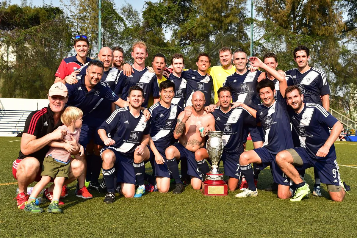 Club Albion celebrate winning the Yau Yee League for 2016-17 after winning their match against Colloids FC at King's Park on Sunday April 30, 2017. Bill Cox/Epoch Times)
